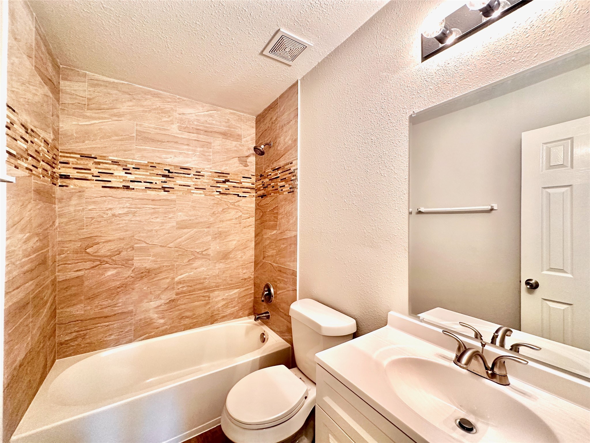 3042 Trinity Pass Court Spring, TX 77373 - Photo 26 of 34 a bathroom with a sink toilet and shower