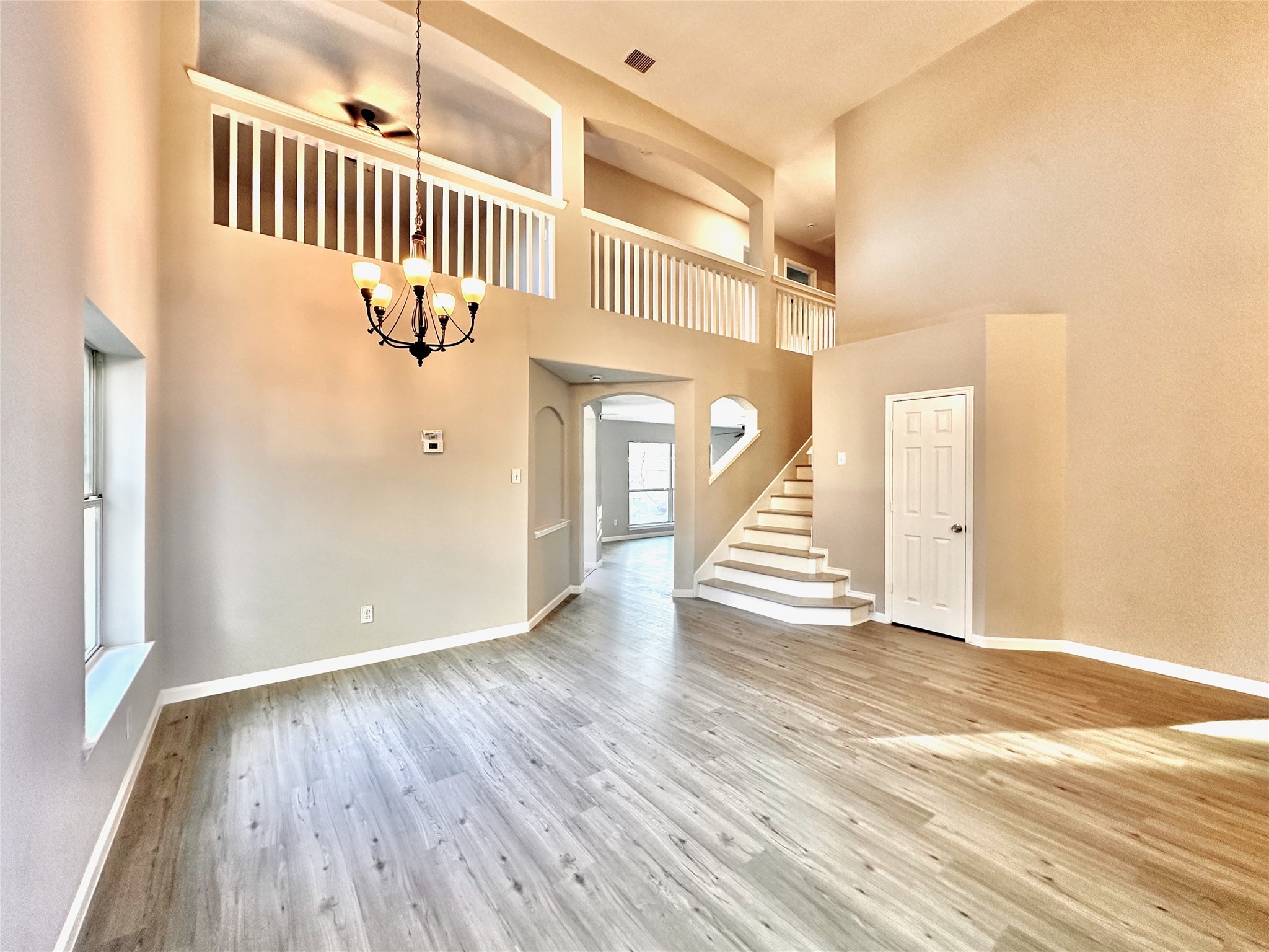 3042 Trinity Pass Court Spring, TX 77373 - Photo 4 of 34 a view of entryway with wooden floor