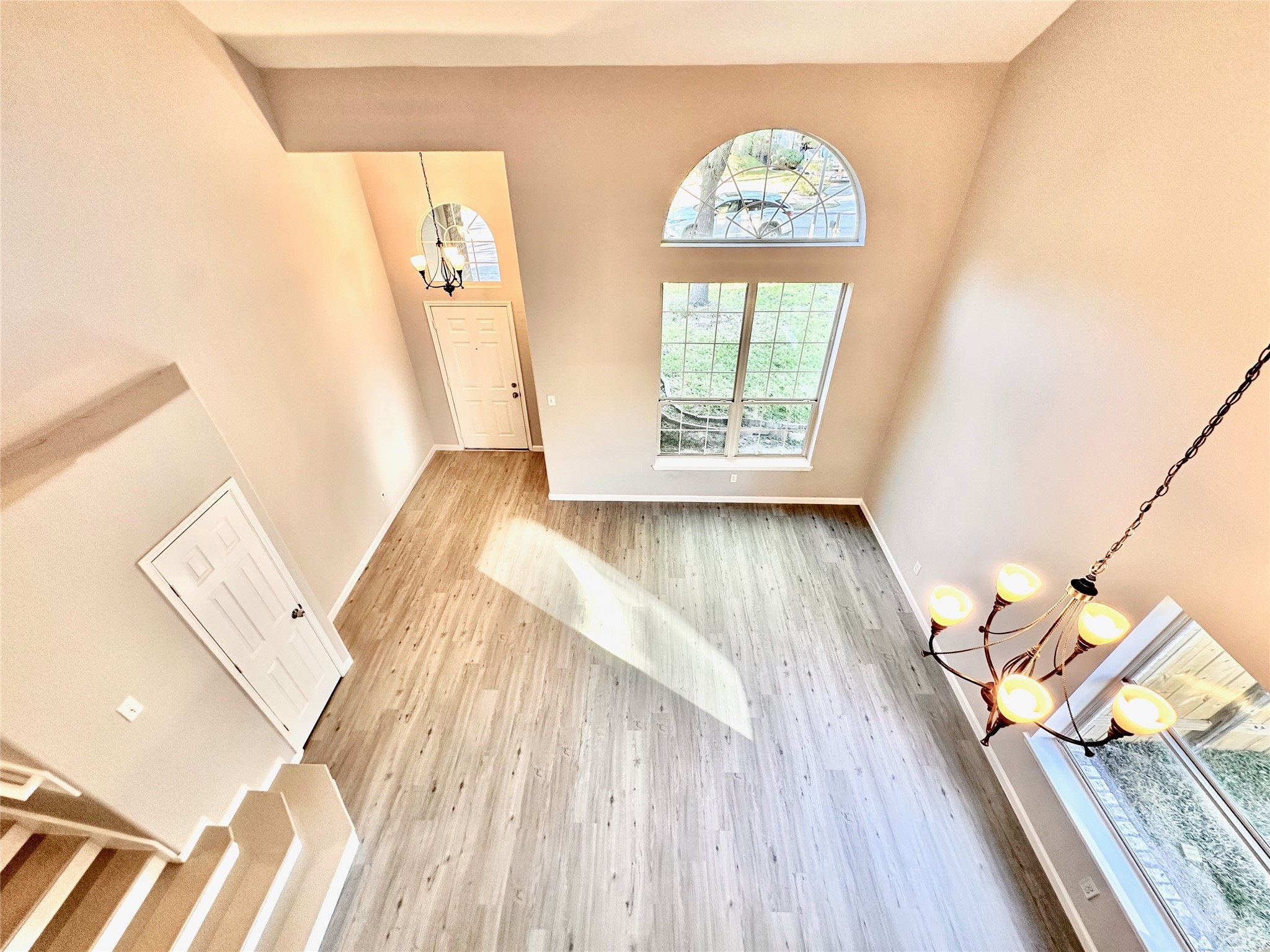 3042 Trinity Pass Court Spring, TX 77373 - Photo 8 of 34 a view of a bedroom with wooden floor and front door