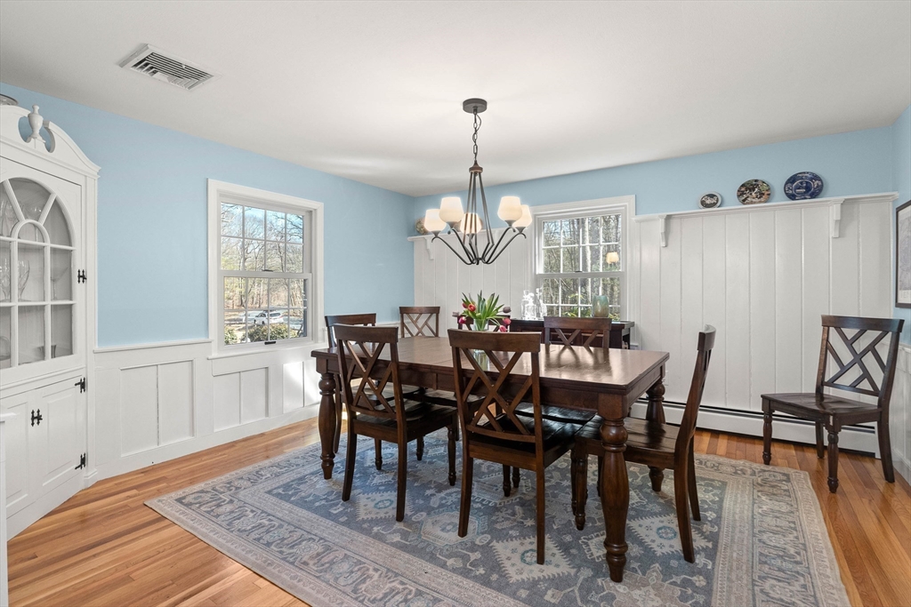 27 Sheffield Road Boxford, MA 01921 - Photo 8 of 29 a view of a dining room with furniture window and wooden floor