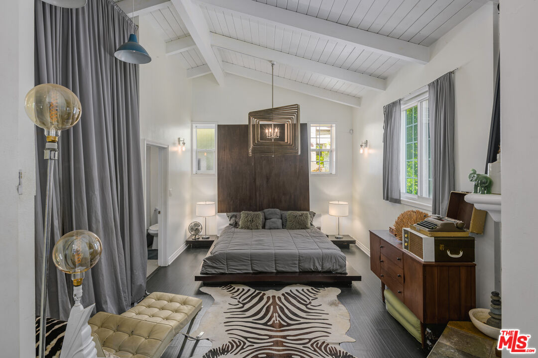 2225 North Cahuenga Boulevard Los Angeles, CA 90068 - Photo 16 of 30 a living room with furniture and a window