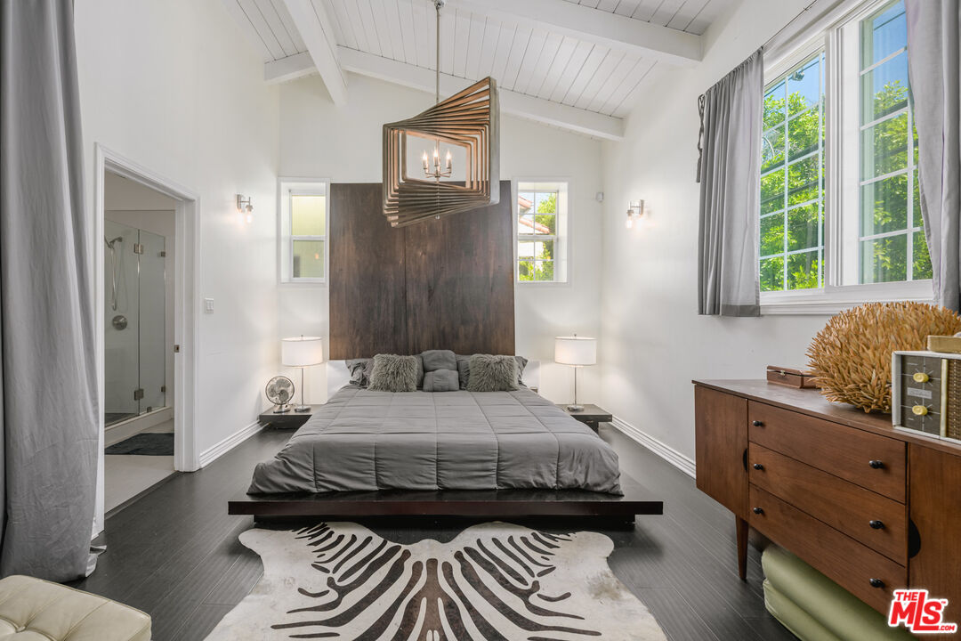 2225 North Cahuenga Boulevard Los Angeles, CA 90068 - Photo 17 of 30 a bedroom with a bed and a window