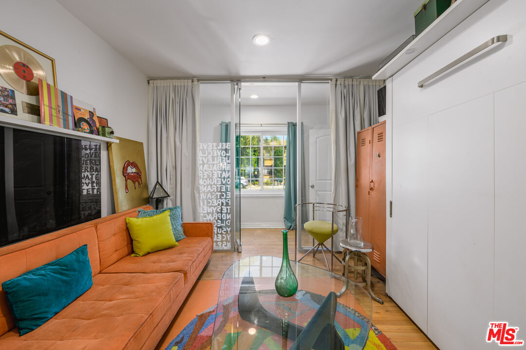 2225 North Cahuenga Boulevard Los Angeles, CA 90068 - Photo 21 of 30 a living room with furniture rug and wooden floor