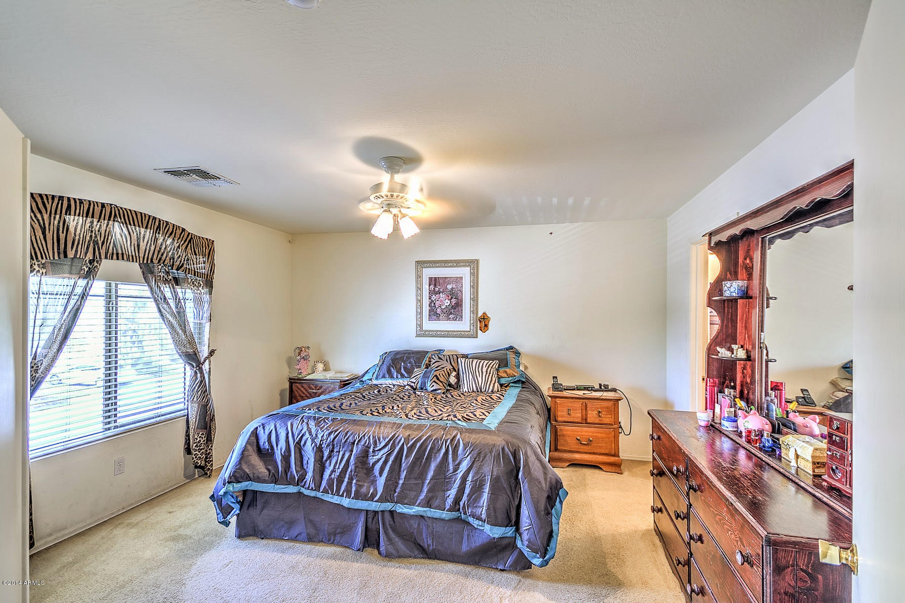 8421 West Payson Road Tolleson, AZ 85353 - Photo 11 of 16 Master bedroom with double doors