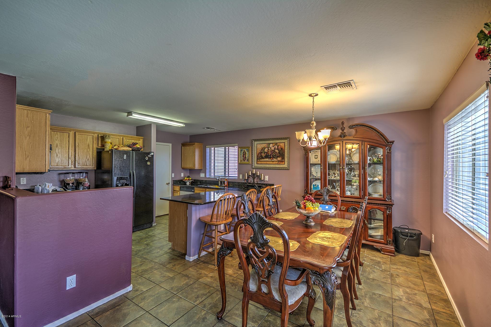 8421 West Payson Road Tolleson, AZ 85353 - Photo 6 of 16 Kitchen view from great room