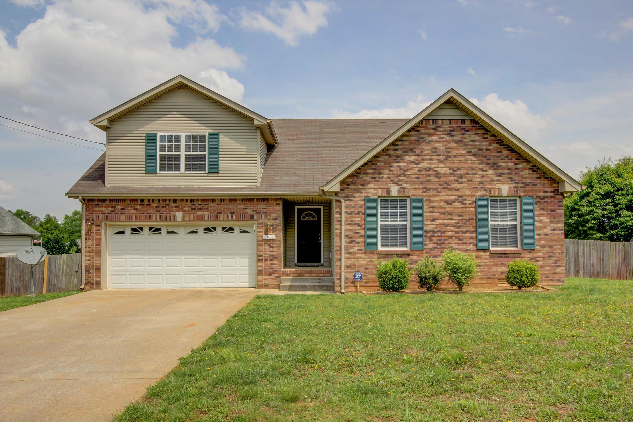 1931 Needmore Road Clarksville, TN 37042 - Photo 1 of 25 Front of home with landscaping.