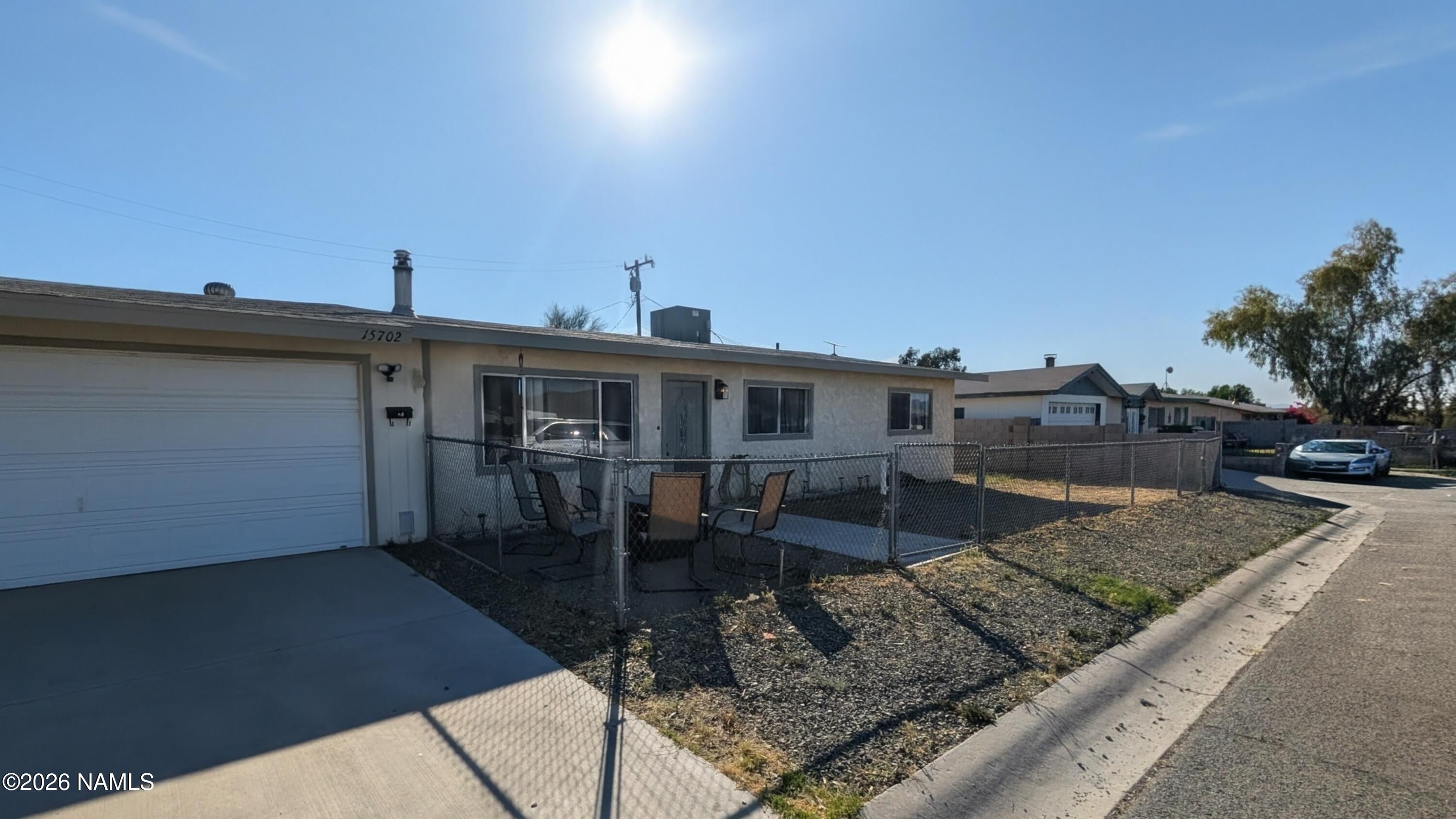 15702 Bonanza Loop Ehrenberg, AZ 85334 - Photo 1 of 13 a view of a terrace with sitting area