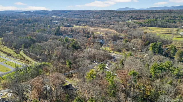 a view of a lake with mountains in the background