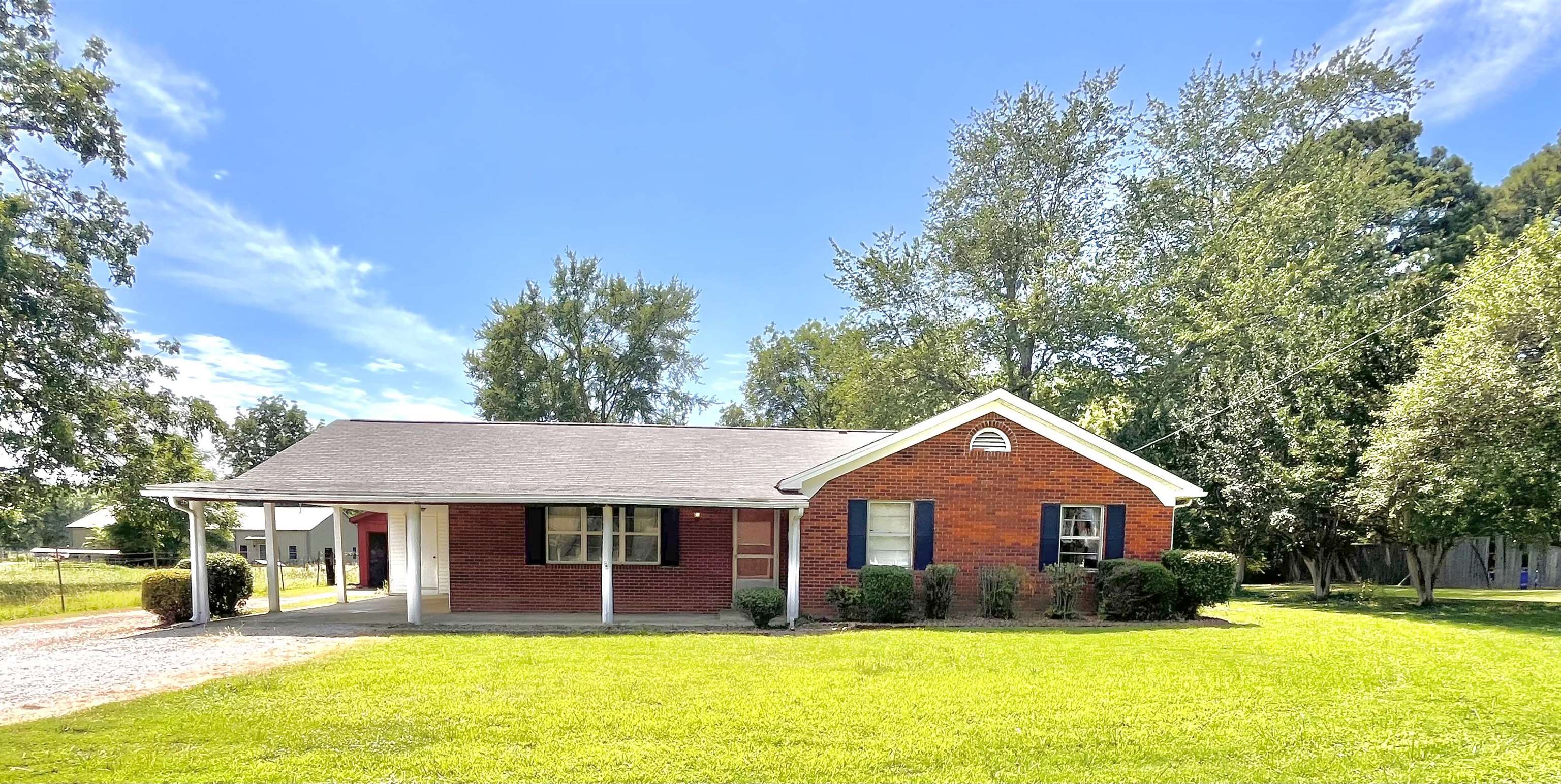 7623 Craft Road Olive Branch, MS 38654 - Photo 1 of 20 Single story home featuring a front yard and a carport