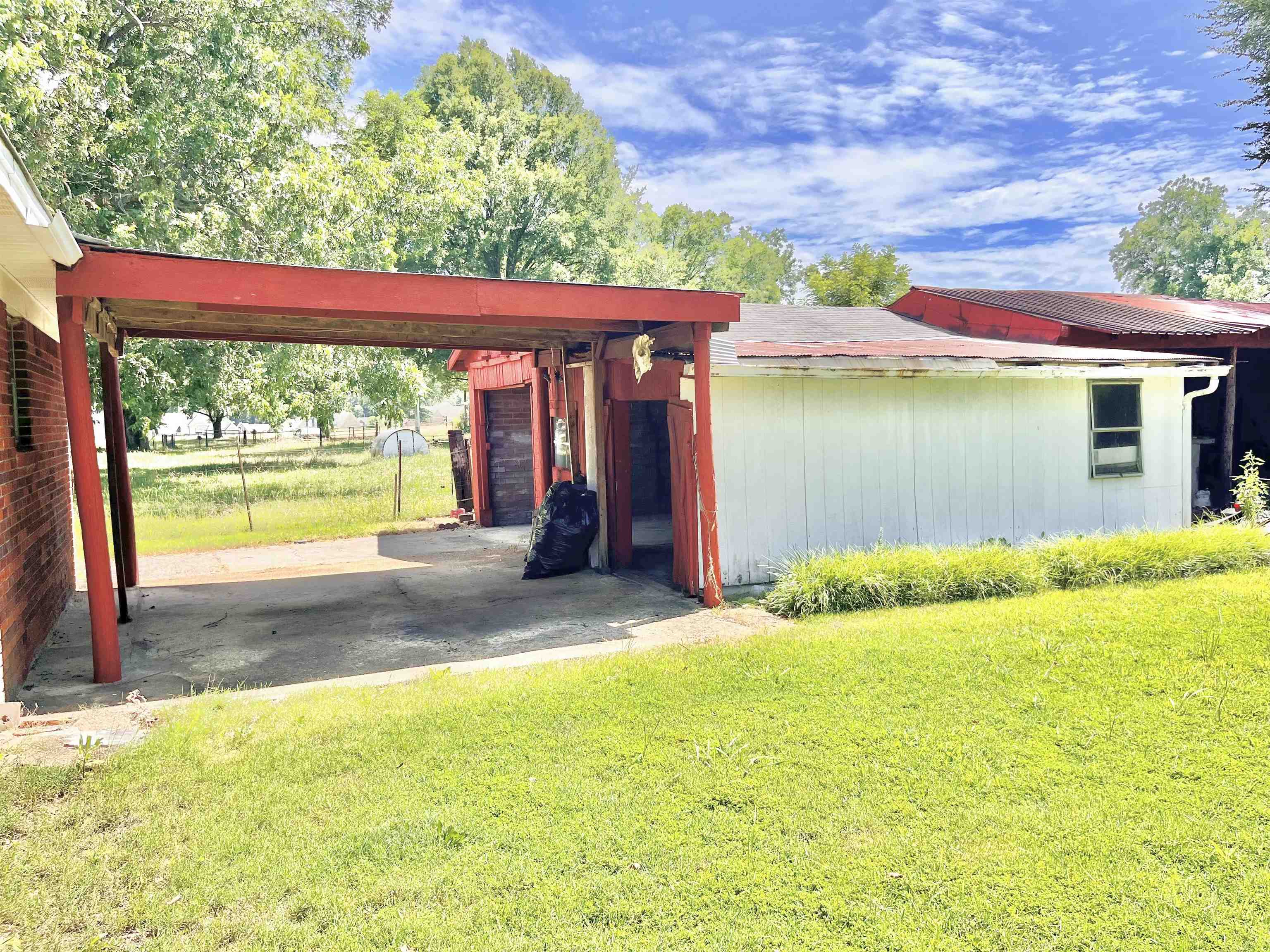 7623 Craft Road Olive Branch, MS 38654 - Photo 6 of 20 Breezeway and detached carport/shed