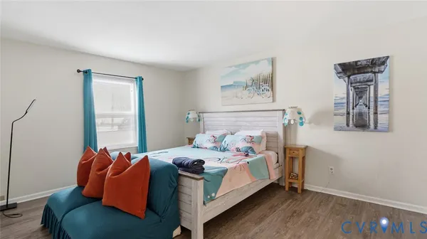 a bed room with a bed and a window