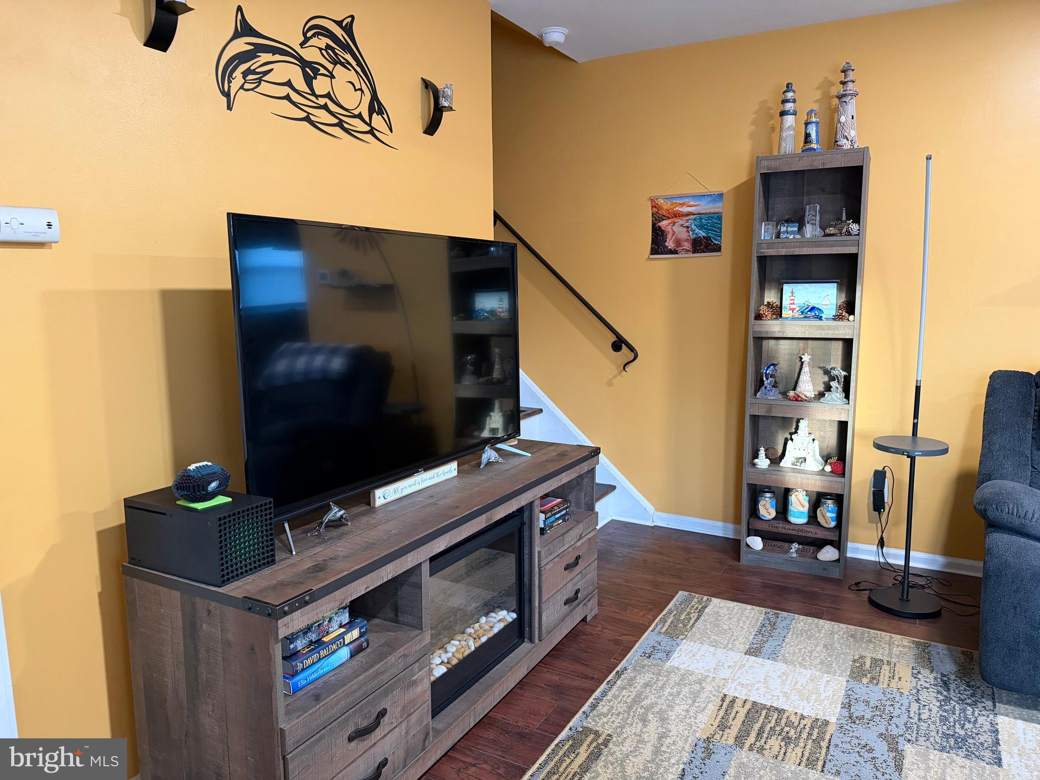 1 Nassau Road Somers Point, NJ 08244 - Photo 15 of 43 a living room with furniture and a flat screen tv