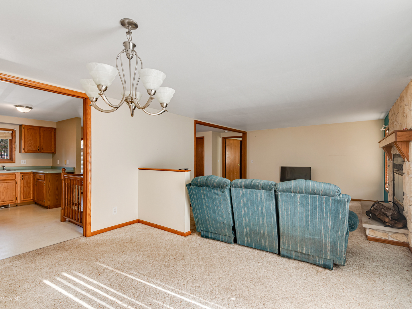 22105 Anthony Road Marengo, IL 60152 - Photo 14 of 27 a living room with furniture and a chandelier