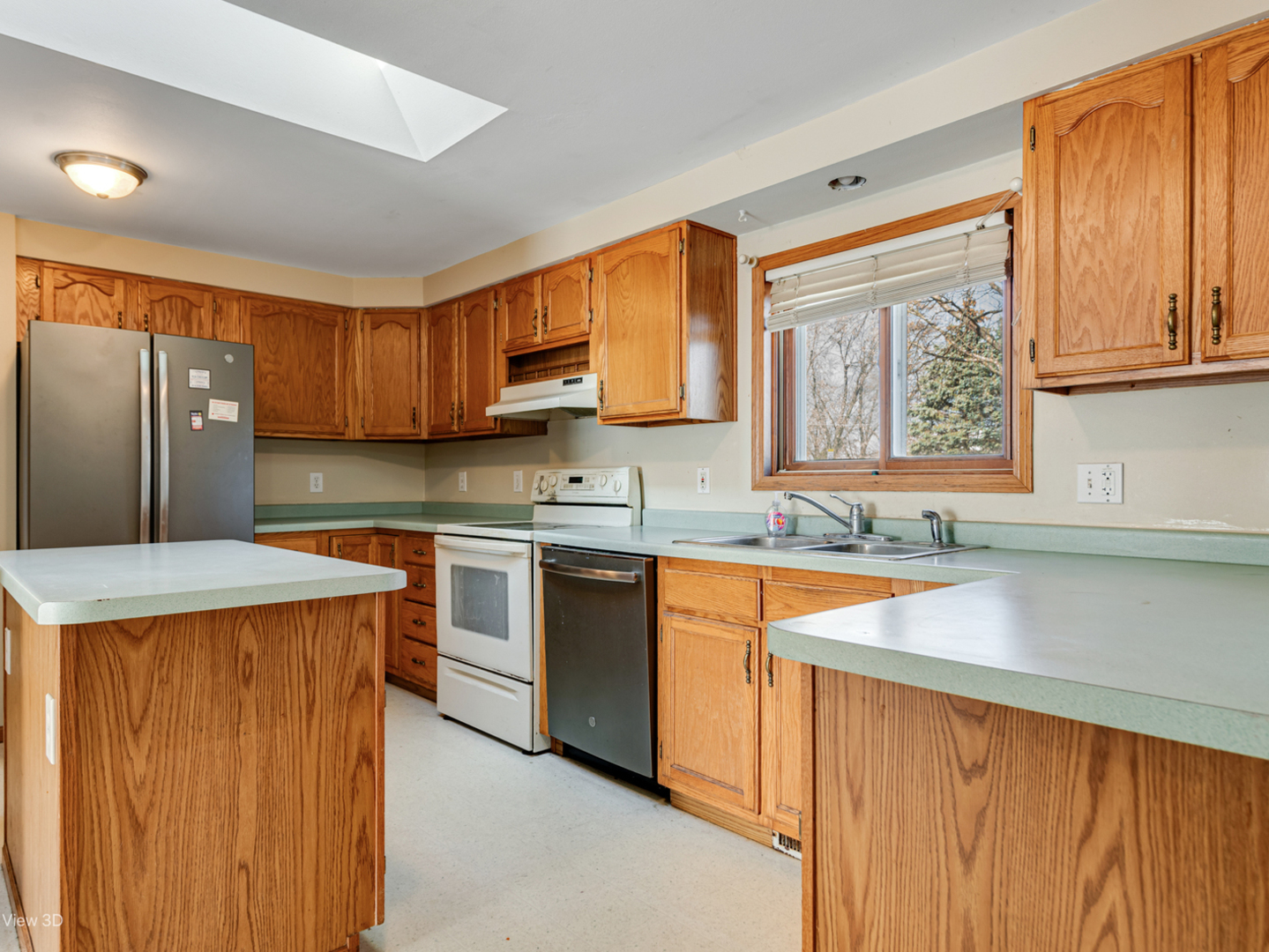22105 Anthony Road Marengo, IL 60152 - Photo 5 of 27 a kitchen with stainless steel appliances granite countertop wooden cabinets a sink and a stove