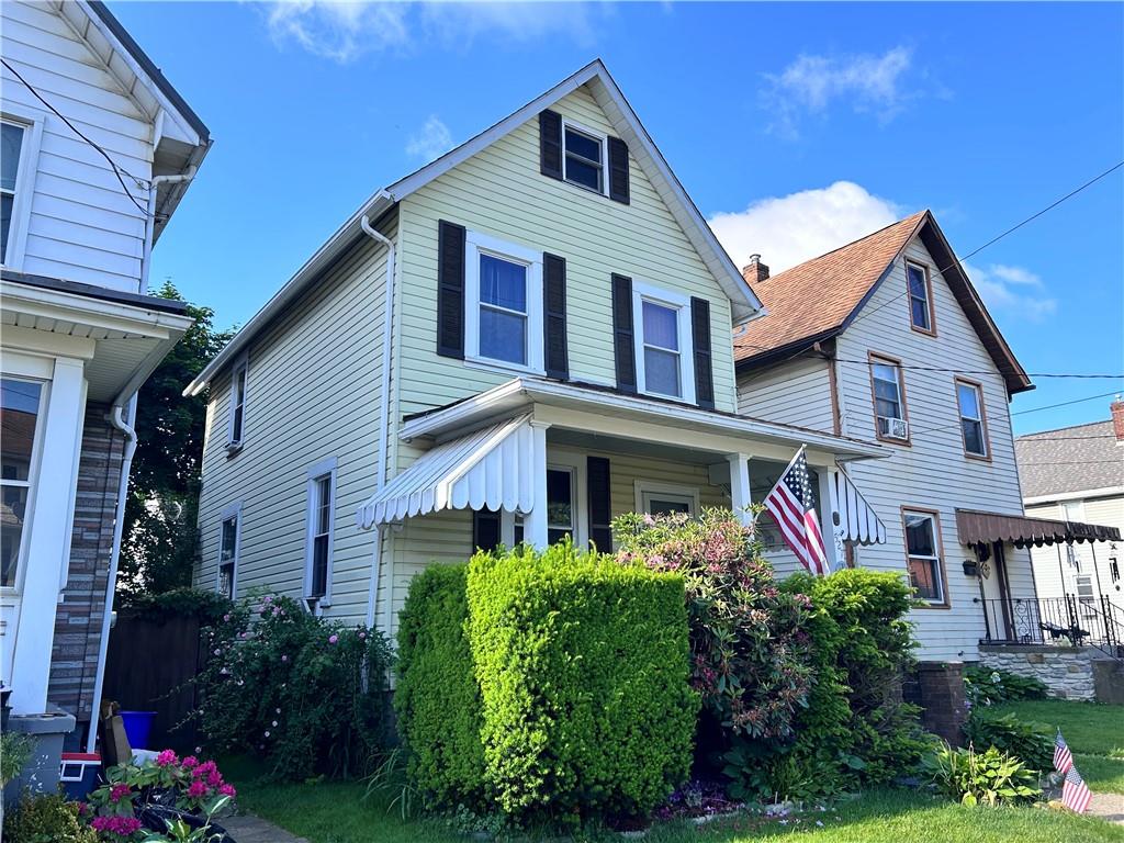 527 Carbon Street Butler, PA 16001 - Photo 14 of 19 a front view of a house with garden