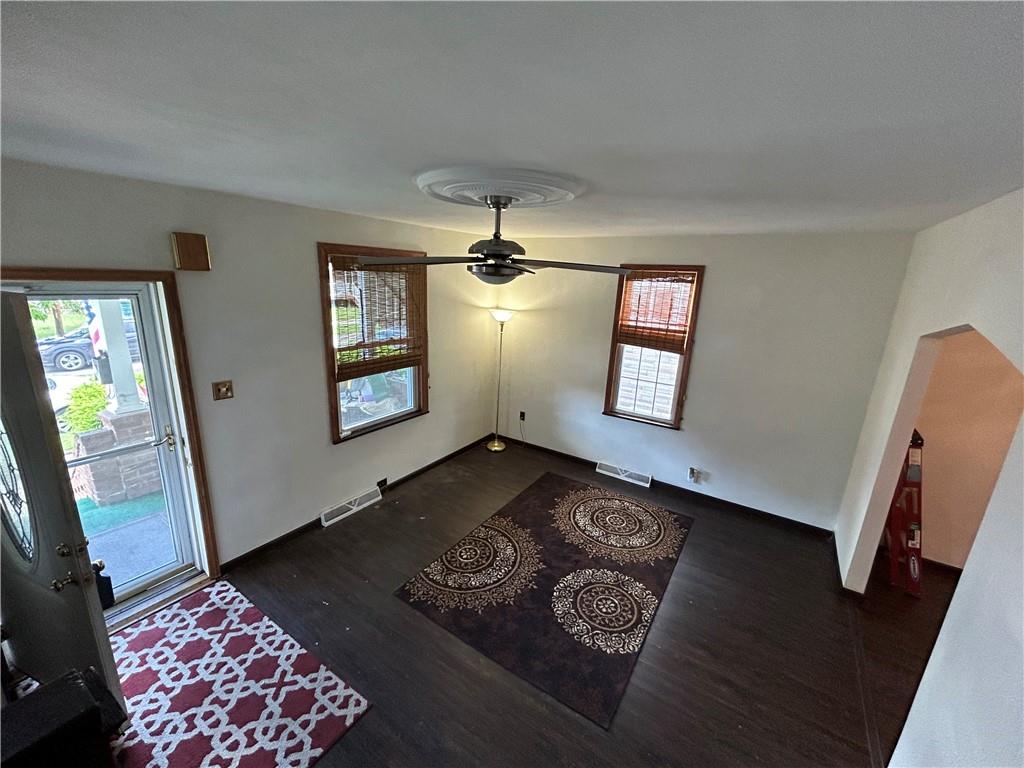 527 Carbon Street Butler, PA 16001 - Photo 3 of 19 a living room with furniture and a rug