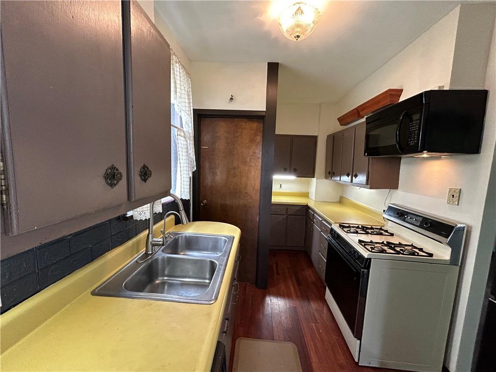 527 Carbon Street Butler, PA 16001 - Photo 6 of 19 a kitchen that has a sink and a stove