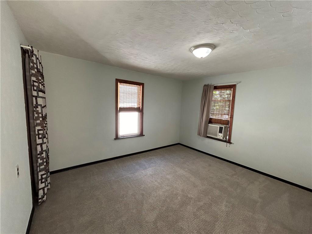 527 Carbon Street Butler, PA 16001 - Photo 9 of 19 an empty room with windows