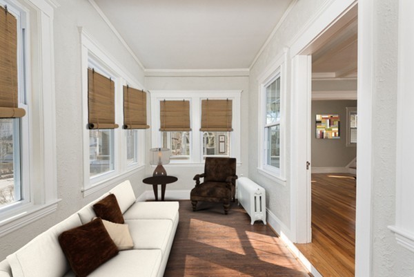 39 Willoughby Road Milton, MA 02186 - Photo 7 of 20 a living room with furniture and a large window