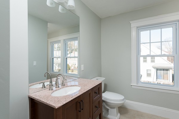 39 Willoughby Road Milton, MA 02186 - Photo 9 of 20 a bathroom with a sink and a toilet