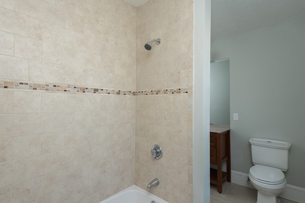39 Willoughby Road Milton, MA 02186 - Photo 10 of 20 a bathroom with a shower and a toilet