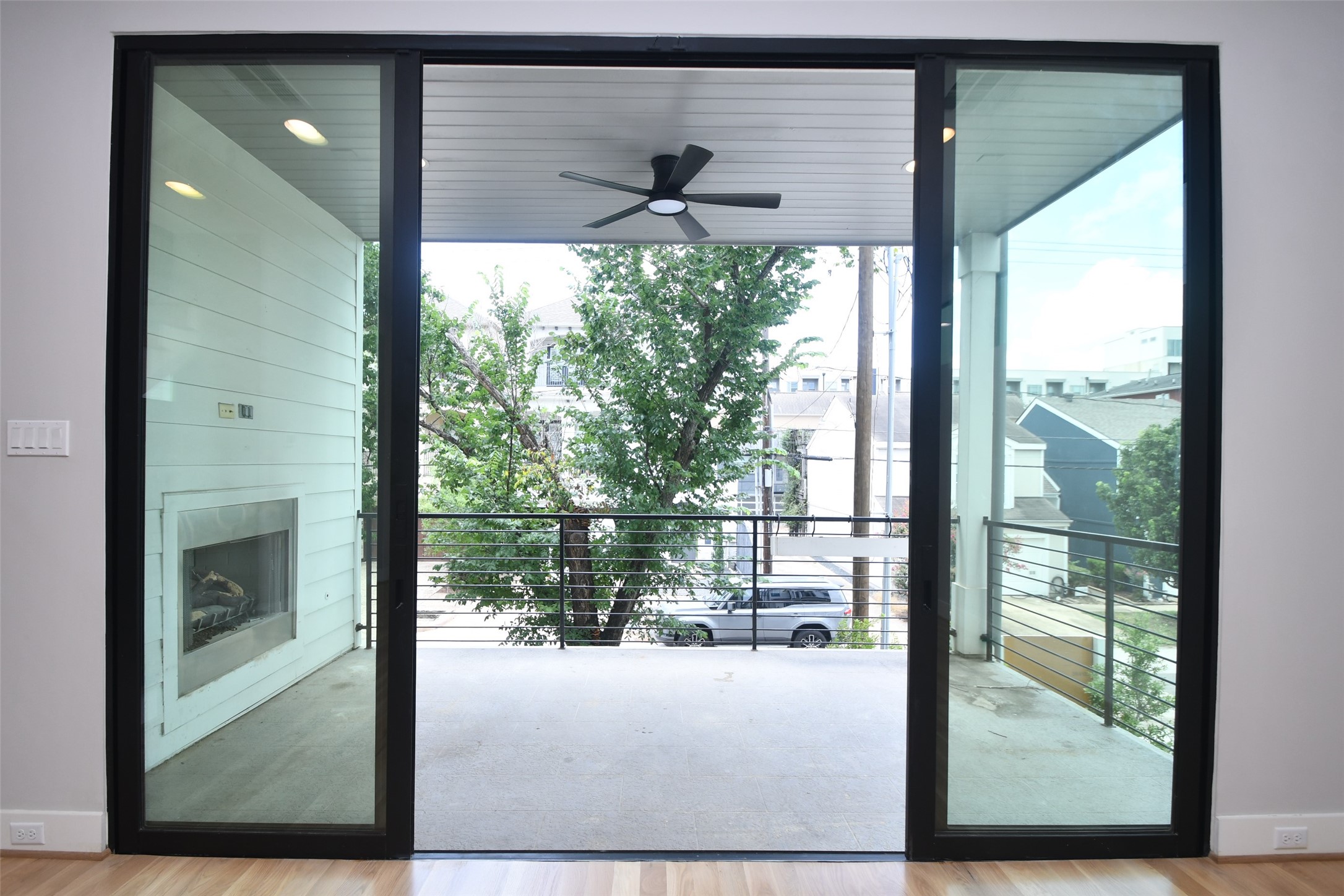 818 Knox Street Houston, TX 77007 - Photo 10 of 39 a view of a glass door and the window