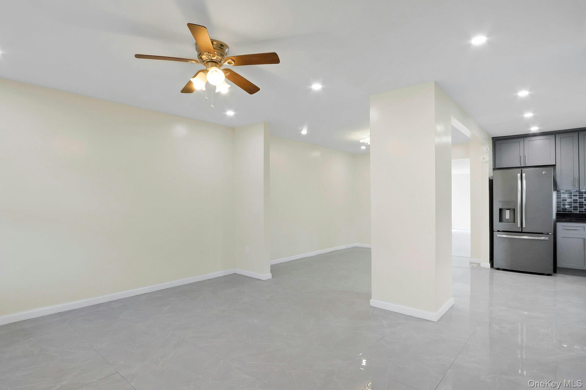 22 Firth Street, Unit 22 Cornwall, NY 12518 - Photo 7 of 42 Living room looking toward dining room and kitchen
