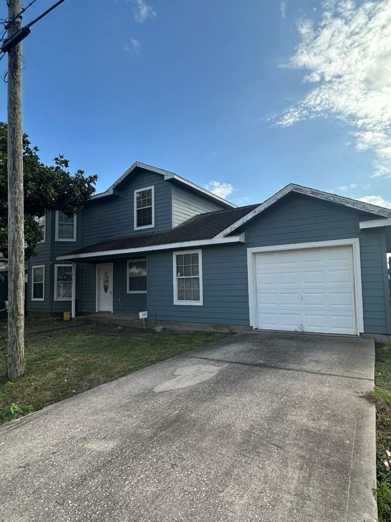 8404 Leander Street Houston, TX 77012 - Photo 3 of 6 a front view of a house with a yard