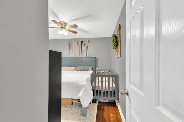 a view of a livingroom with furniture and wooden floor