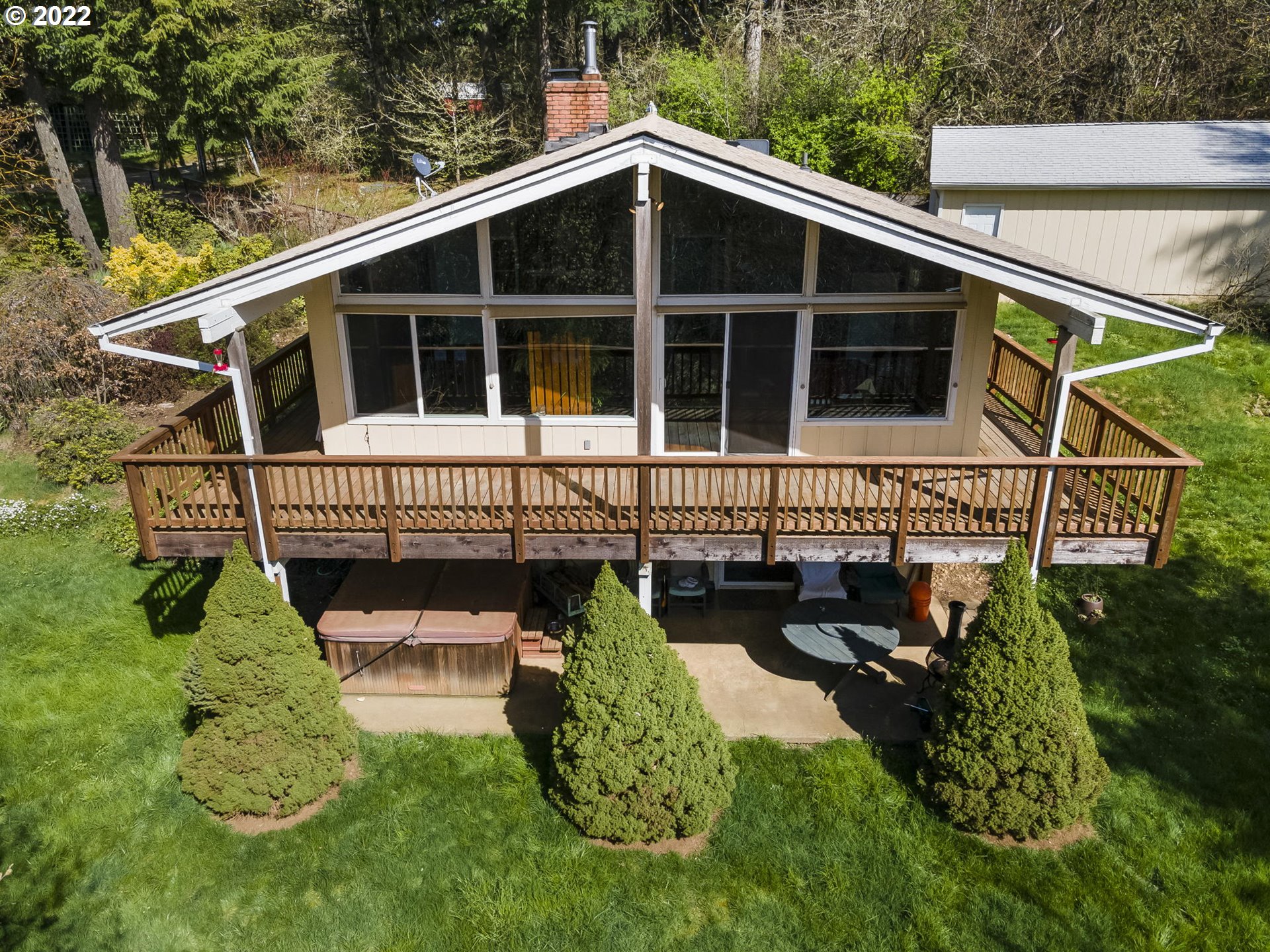 39530 Southwest Gibson Road Gaston, OR 97119 - Photo 1 of 31 a front view of a house with a yard