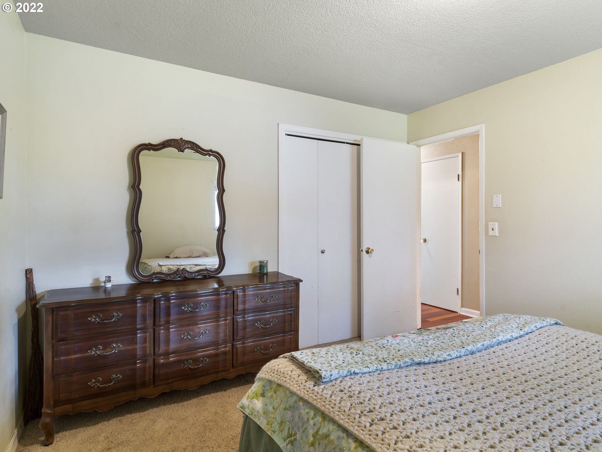39530 Southwest Gibson Road Gaston, OR 97119 - Photo 21 of 31 a bedroom with a bed and a dresser