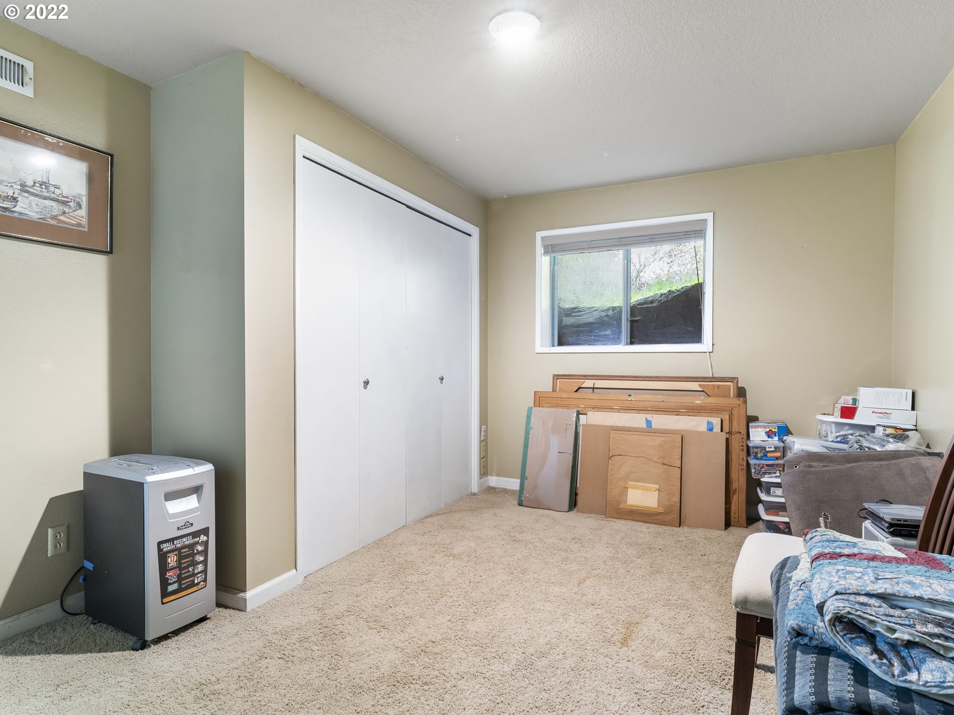 39530 Southwest Gibson Road Gaston, OR 97119 - Photo 23 of 31 a bedroom with a bed and a window