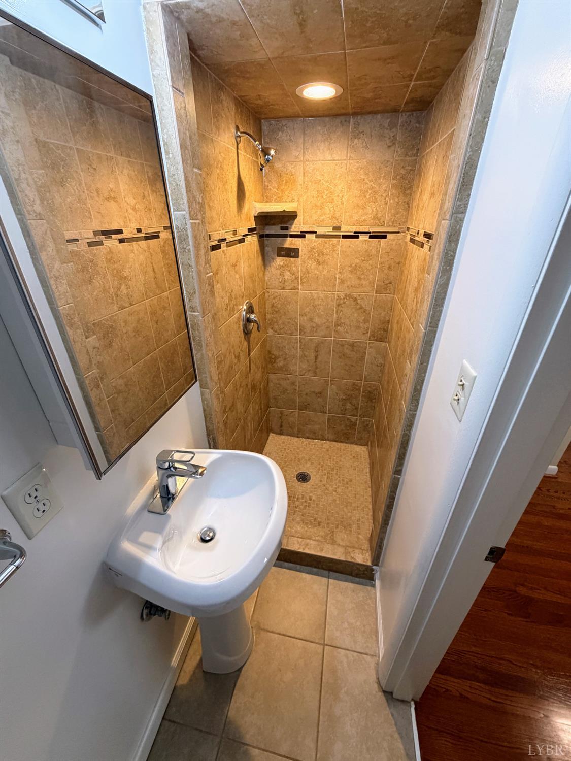 106 Bryant Road Lynchburg, VA 24502 - Photo 15 of 39 a bathroom with a sink a toilet and shower
