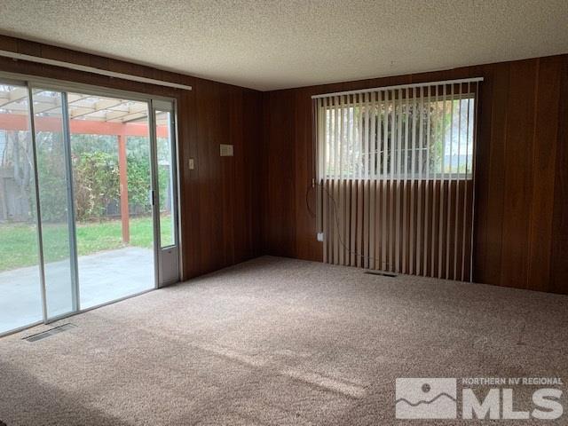 965 Joshua Drive Reno, NV 89509 - Photo 3 of 19 a view of an empty room with windows