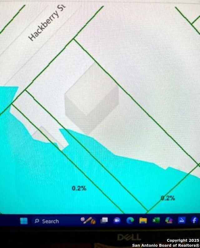 406 Hackberry Street Bandera, TX 78003 - Photo 34 of 34 a view of a back yard