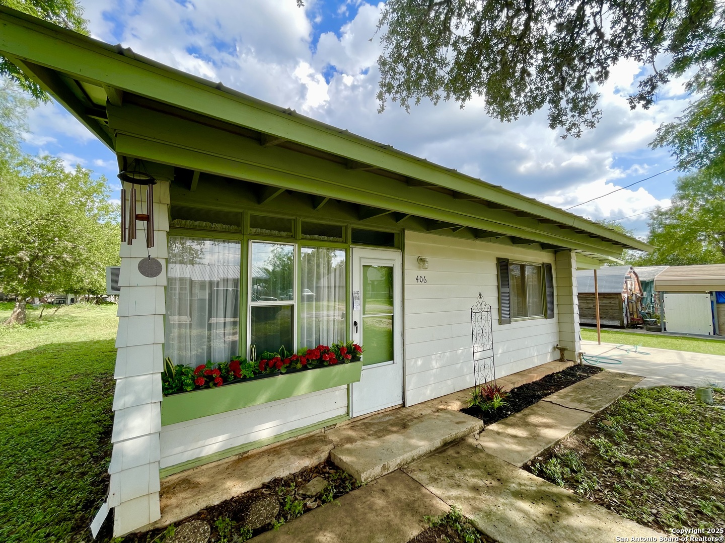406 Hackberry Street Bandera, TX 78003 - Photo 6 of 34 a view of a backyard with garden
