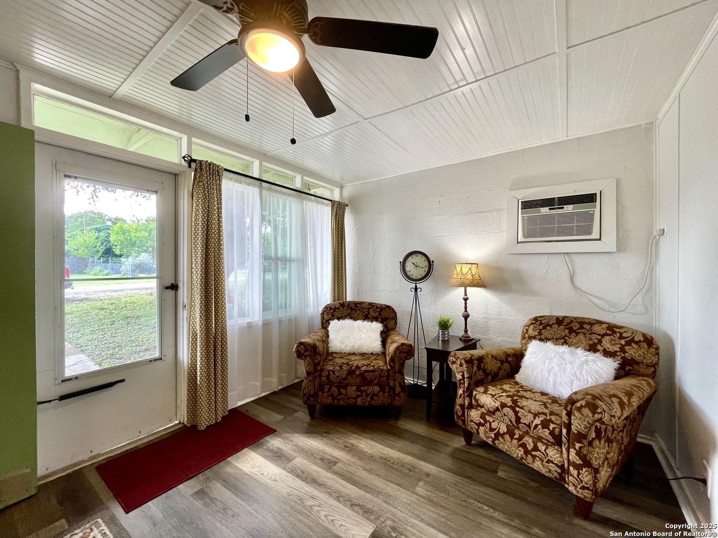 406 Hackberry Street Bandera, TX 78003 - Photo 8 of 34 a bedroom with bed and window