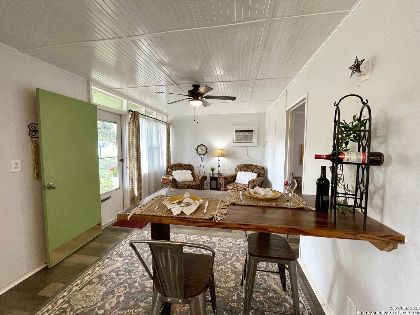 406 Hackberry Street Bandera, TX 78003 - Photo 10 of 34 a view of a dining room with furniture