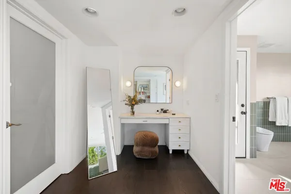 a view of living room with furniture and fireplace