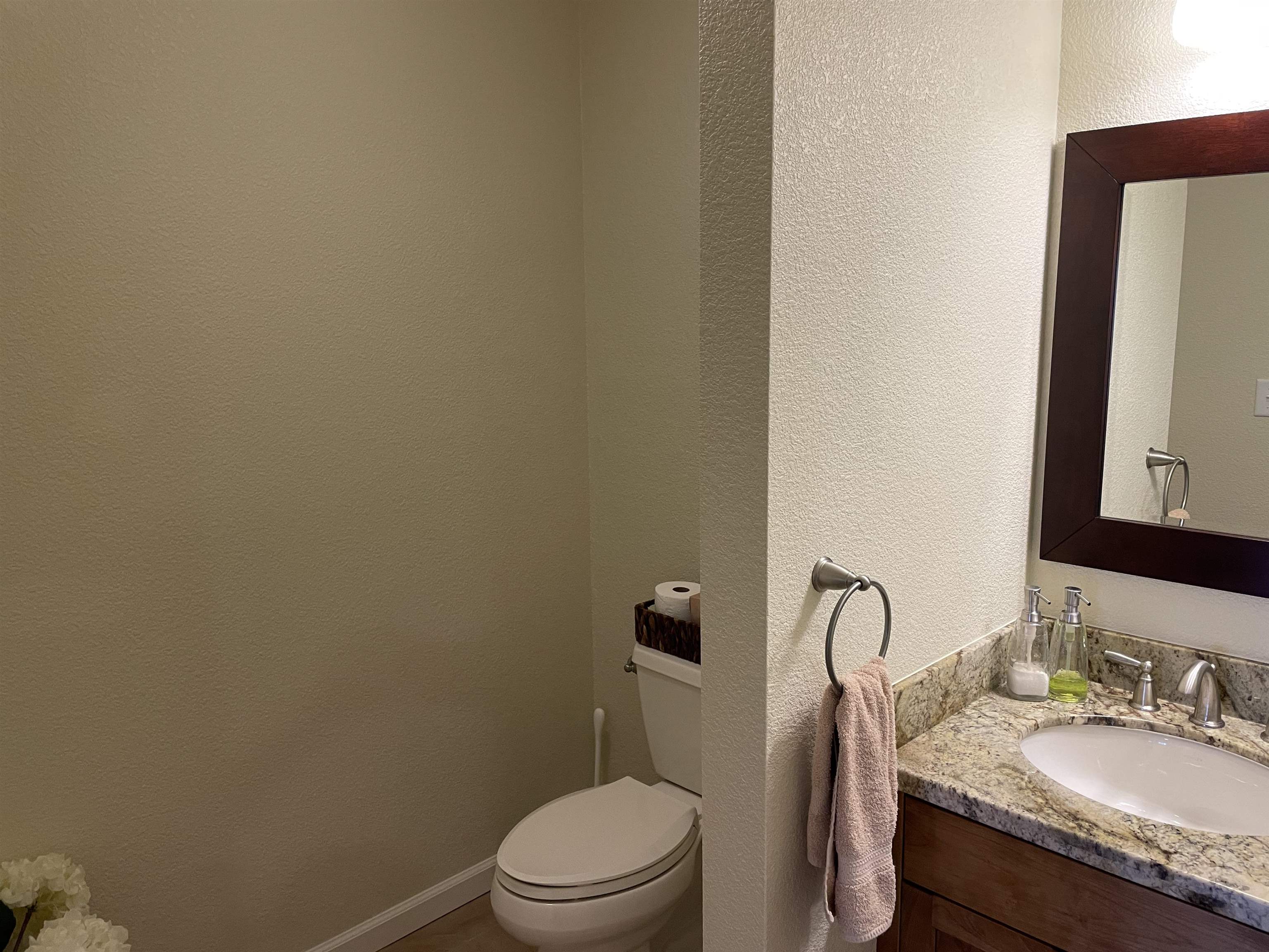 831 Timber Ridge Road Lake Almanor, CA 96137 - Photo 24 of 36 a white toilet sitting next to a bathroom sink