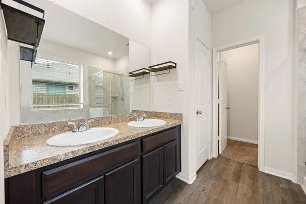 a white bath tub sitting next to a window