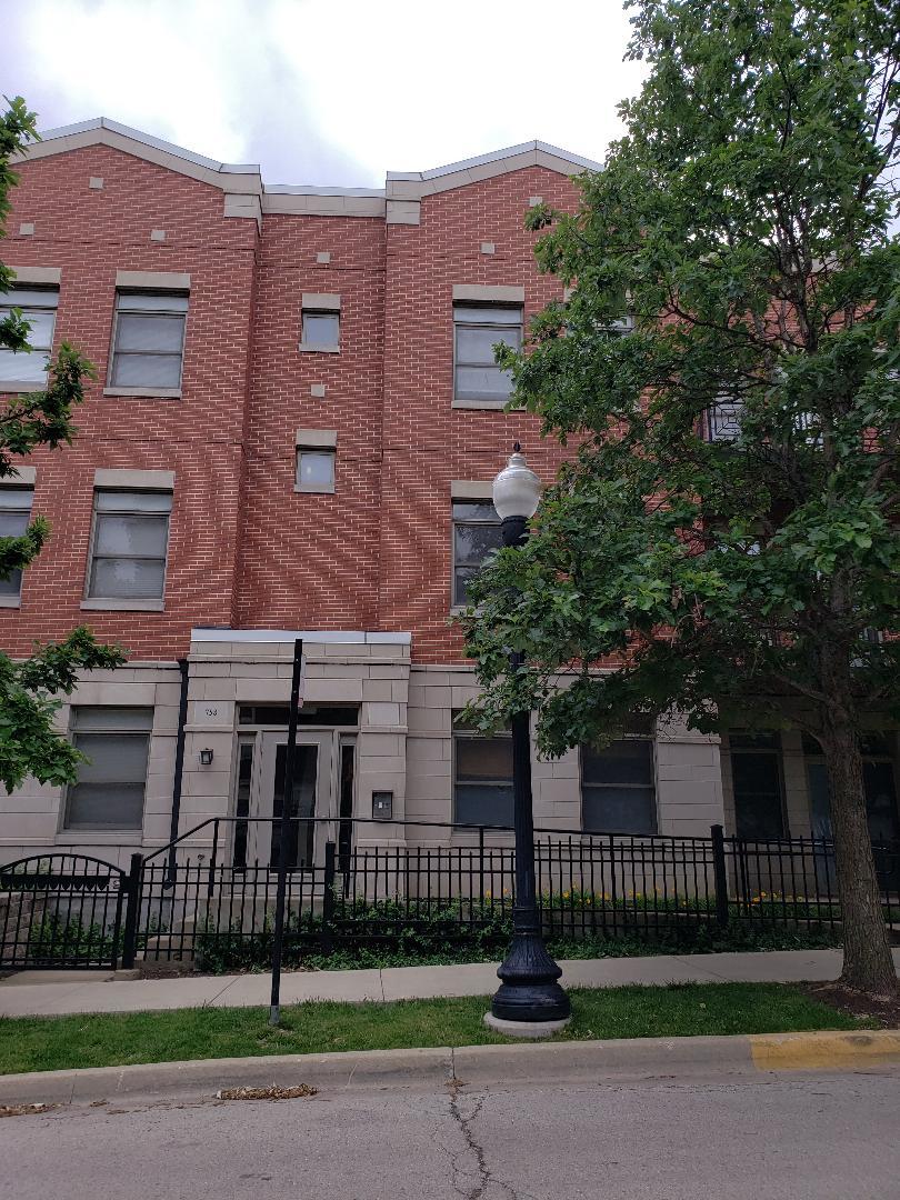 758 West 15th Street, Unit 3B Chicago, IL 60607 - Photo 1 of 30 front view of a house with a garden