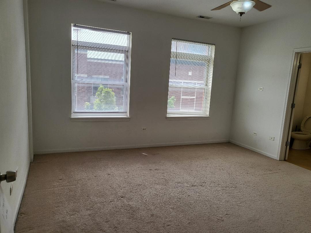 758 West 15th Street, Unit 3B Chicago, IL 60607 - Photo 13 of 30 an empty room with a window