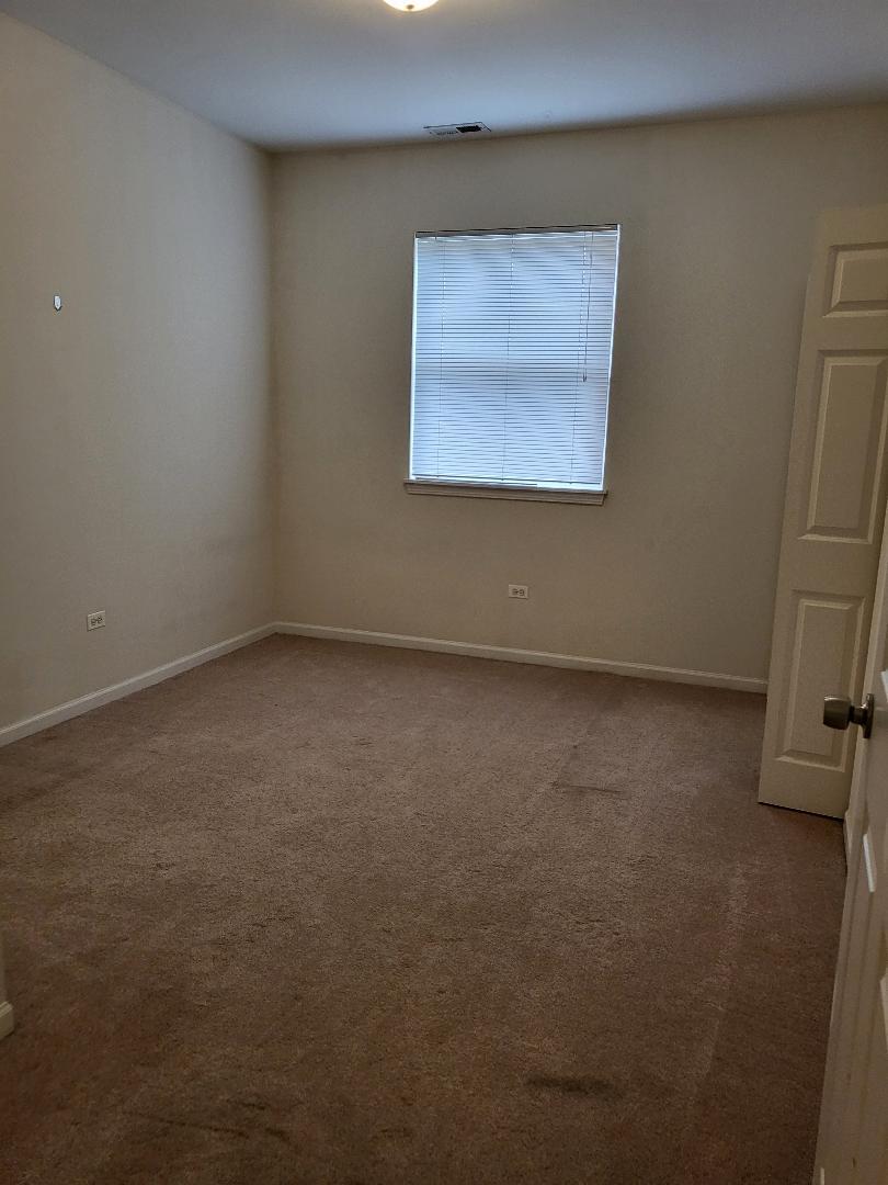 758 West 15th Street, Unit 3B Chicago, IL 60607 - Photo 17 of 30 an empty room with a workbench