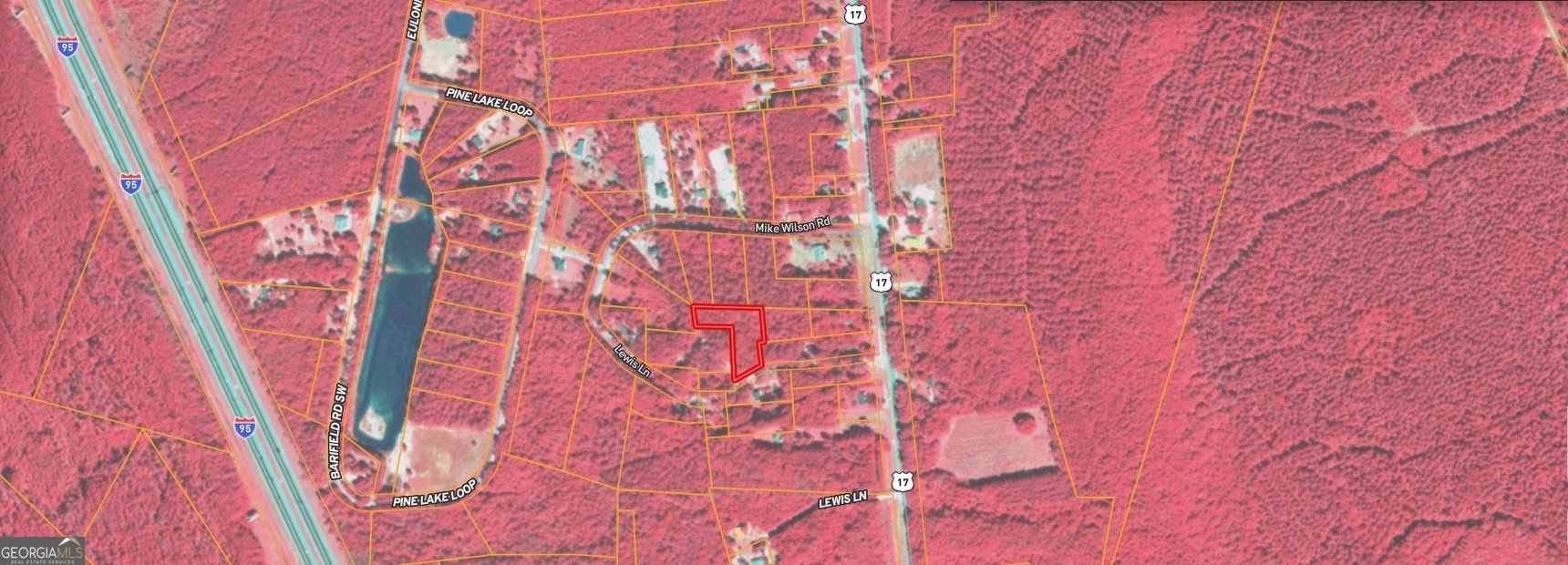 0 Lewis Lane, Unit 1 Townsend, GA 31331 - Photo 7 of 8 a backyard of a house with a street