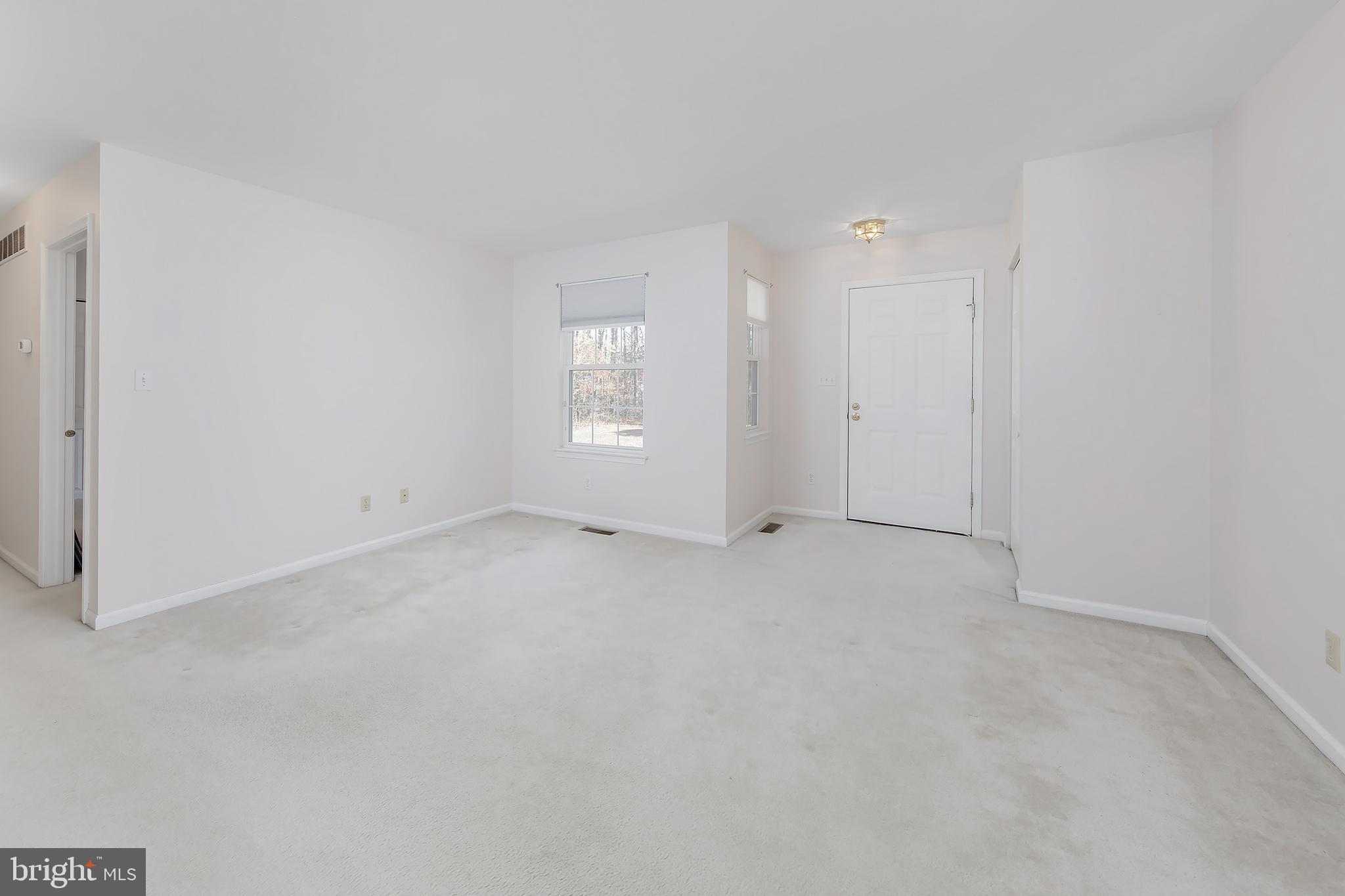 4056 Oak Road Buena, NJ 08310 - Photo 5 of 39 an empty room with windows and closet