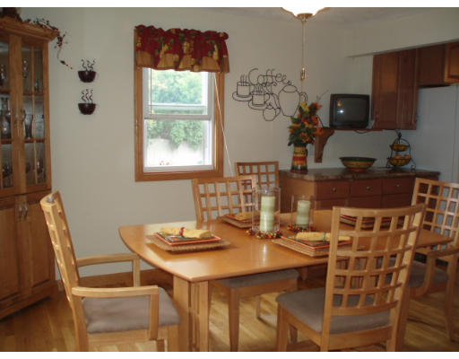 1 Emeline Road Weymouth, MA 02189 - Photo 4 of 12 a dining room with a table and chairs