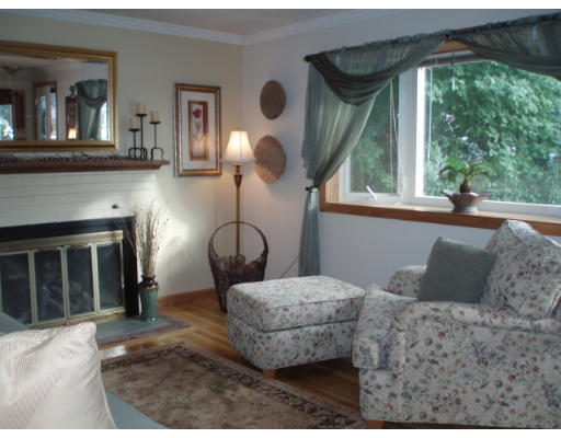 1 Emeline Road Weymouth, MA 02189 - Photo 6 of 12 a living room with furniture and a fireplace