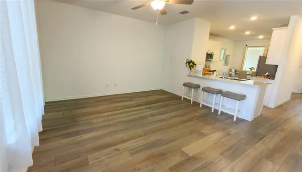 a large room with wooden floor