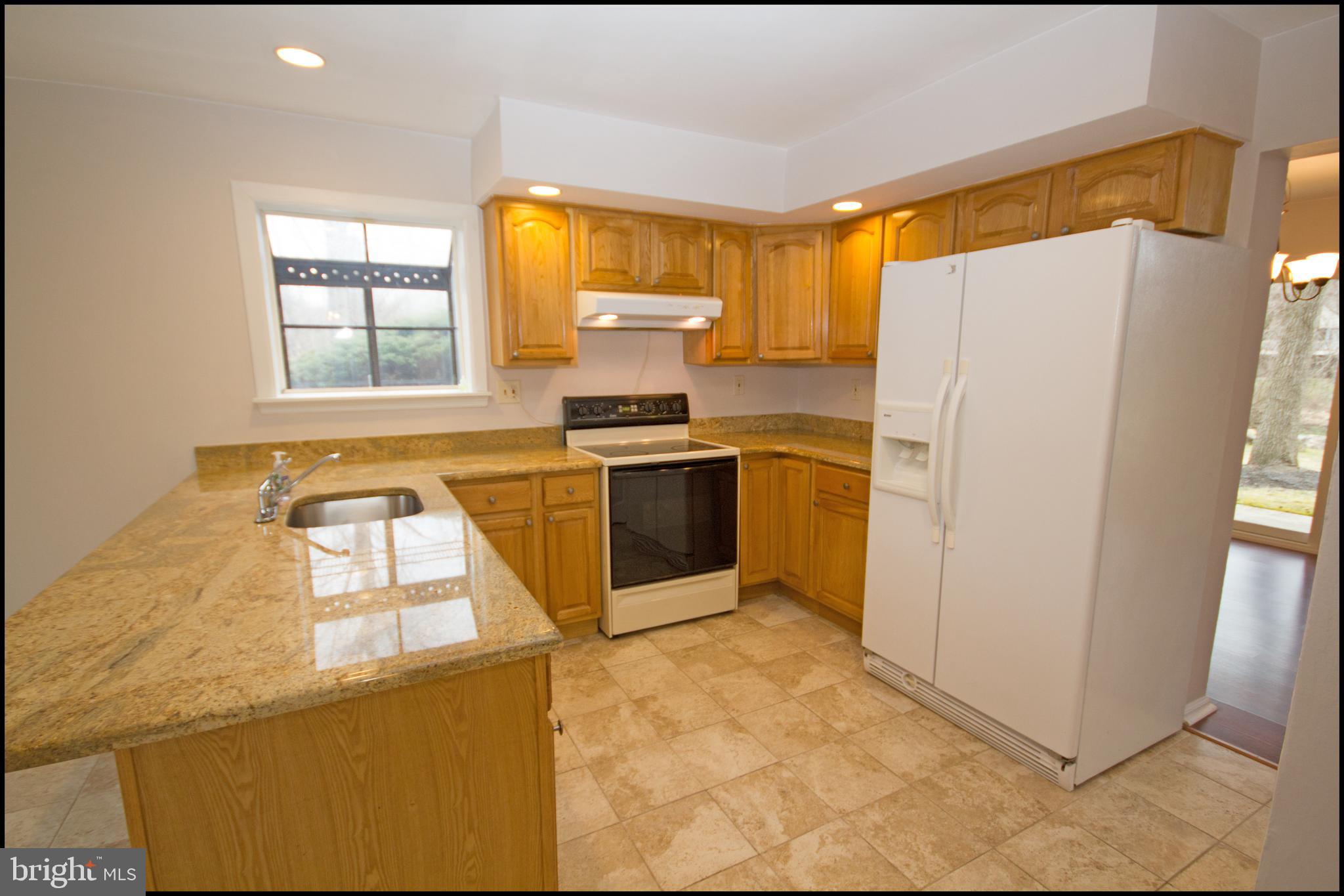 22 Knox Court Chesterbrook, PA 19087 - Photo 6 of 33 Updated kitchen with Granite Countertops. Seating.